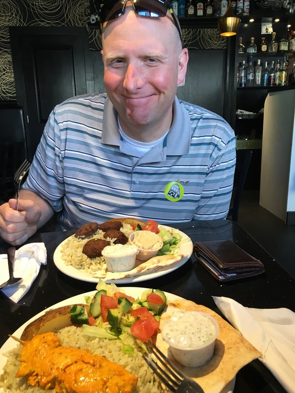 vegetarian sampler plate and kabob with rice.